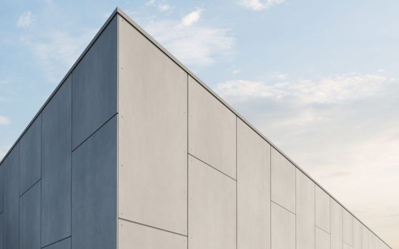 Edificio con facciata ventilata in fibrocemento